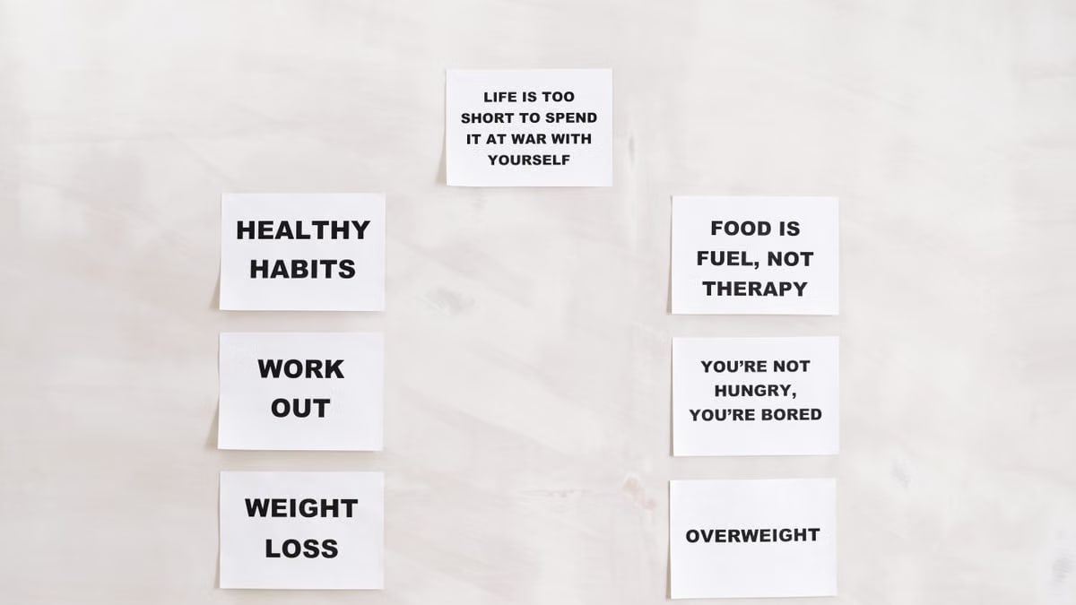 Minimalist display of motivational health and wellness quotes emphasizing healthy habits and weight management.